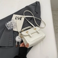 White minimalist leather crossbody bag with gold buttons and plush doll charm - With Pendant / Off White