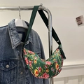 Green crescent crossbody bag with ethnic floral print and wide adjustable strap - Green