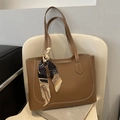 Brown faux leather tote bag with white contrast stitching and elegant printed silk scarf - Tan