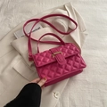 Chic magenta quilted square handbag with adjustable strap and top handle in 45-degree view - Rose Pink