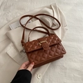Caramel brown quilted small square bag with gold lock buckle and top handle for women - Brown