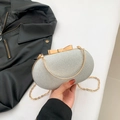 Pochette da sera argento glitterata con chiusura a fiocco dorato e catena - Argento