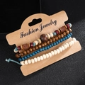 Ethnic multilayer wood bead bracelet set with ceramic charms in vintage boho style - Ethnic Ceramic Wood Bead Four Piece Set (B480) / Brown