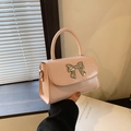 Sac bandoulière en cuir verni rose avec nœud argenté et poignée supérieure chic - Rose