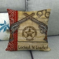 Detail of vintage cowboy linen pillowcase with revolver and star badge on sofa - Ranger Star Badge Style (15)
