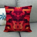 Detalle de funda de cojín de lino con diseño geométrico abstracto rojo en un sofá - Geométrico Abstracto Rojo Naranja (2)