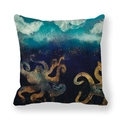 Detail of dark blue and gold octopus print cushion cover on peach skin fabric texture - Deep Blue Luxury Octopus