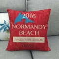 Detail of red vintage linen pillow cover featuring blue dolphin print on a grey sofa - Normandy Beach Retro Dolphin Style (6)