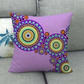 Detail of linen pillowcase with purple geometric circle patterns on a grey sofa - Light Purple Modern Art Rings (10)