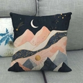 Close-up of linen cushion cover featuring artistic mountain and moon landscape on a sofa - Dark Blue and Pink Contrast Starry Sky Mountain Style (18)