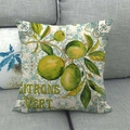 Fodera per cuscino in lino con motivo limoni verdi e testo su un divano grigio - 45x45 cm / Lime Verde (CITRONS VERT)