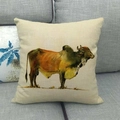 Artistic linen pillow cover with watercolor bull oil painting on a gray fabric sofa - Watercolor Bull Head Pattern