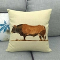 Detailed texture of a linen pillowcase featuring a watercolor brown bull print on a sofa - Brown Bull Illustration Pattern