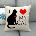 Detail of linen pillowcase with black cat silhouette and red heart on a sofa - I Love My Cat (9)