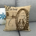 Cojín de lino vintage con la Torre Eiffel y noria sobre un sofá de color gris - Gran Noria (3) / 45x45cm