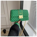 Detail of green quilted crossbody bag with gold FASHION buckle and metal chain strap - Green