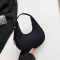 Black crocodile embossed crescent hobo bag with gold hardware and stylish curved shape - Black