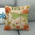 Housse de coussin en lin avec motif libellule vintage et fleurs sur un canapé - Style Floral Libellule Verte (1)