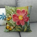 Detailaufnahme Leinen-Kissenbezug mit rosa Blumenmuster und Schmetterling auf Sofa - Home Schriftzug Rosa Blumen (3)