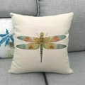 Close-up of linen pillow cover with detailed dragonfly print on a grey sofa fabric - Vintage Red Dragonfly (3) / 45x45cm