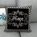 Linen throw pillow case with Hope print and retro scroll border on grey sofa - HOPE Style