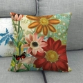 Leinen-Kissenbezug mit Blumenmuster und DREAM-Schriftzug auf grauem Stoffsofa - Dream Schriftzug Mehrfarbige Blumen (4)