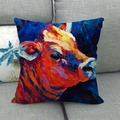 Artistic oil painting cow pattern linen pillow cover on a modern grey sofa - Deep Blue Bright Orange Dynamic Bull Head (11)