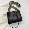 Black quilted tote bag with gold lettering and houndstooth patterned wide strap - Black