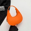 Fashionable bright orange crescent bag with crocodile pattern and golden hardware - Orange