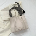 Quilted off-white tote bag with houndstooth strap and minimalist fashion lettering - Off White