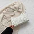White quilted faux leather baguette bag with minimalist woven pattern and slim shoulder strap - White
