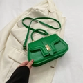 Bright green leather crossbody handbag with geometric design and gold hardware - Green