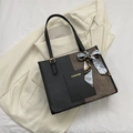 Fashionable large tote bag in black and brown contrast leather with silk scarf handle - Black
