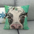 Artistic cow oil painting on textured linen pillow cover shown on a grey sofa - 18x18 Inch / Artistic Cow
