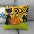 Funda de cojín de lino Halloween con calabaza y gato negro en un sofá gris - Estilo Gato Negro y Calabaza (2)