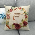 Macro shot of rustic linen pillowcase with pumpkin floral wreath and Welcome Fall text - Welcome Fall Pumpkin Wreath Style (2)