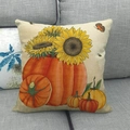 Halloween pumpkin and sunflower linen pillow cover on a cozy gray sofa setting - Sunflower and Pumpkin Style (6)