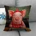 Close-up of linen cushion cover featuring a chef pig print on a grey sofa - Chef Pig (1)