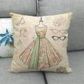 Dettaglio della fodera per cuscino in lino con stampe acquerello di moda vintage - Arte Vintage Profumo Manichino