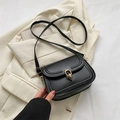 Classic black crossbody bag with gold ring buckle on vintage matte leather finish - Black