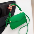 Vibrant green lychee pattern leather crossbody bag with knot handle and gold hardware - Green