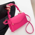 Hot pink textured leather mini crossbody bag with unique knot handle and gold hardware - Rose Red