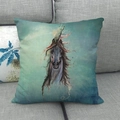 Close-up of linen throw pillow featuring a dynamic blue horse art print on a grey sofa - 45x45cm / Teal Blue Art Horse (11)