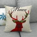 Detail of linen Christmas pillowcase featuring red plaid reindeer and Peace print - 18x18 Inch / Beige Linen Red Black Plaid Deer Peace