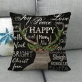 Close-up of a Christmas reindeer antler pillow case with festive text on a gray sofa - 18x18 Inch / Black Christmas English Antlers Design