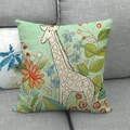Close-up of linen pillowcase featuring a cartoon giraffe and floral patterns on a sofa - Light Green Giraffe Style (13)