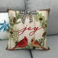 Close-up of linen Christmas pillow cover with red cardinals, pine cones and joy text - Cardinal Pine With Joy Text And Bow Design (10)
