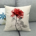 Détail du motif floral X-ray coloré sur une taie d'oreiller en lin posée sur un canapé - Art Transparent Rayons X Rose Rouge(18)