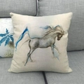 Square linen throw pillow case featuring an artistic watercolor wild horse pattern on grey sofa - Blue Watercolor Running Horse (3)