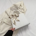 White V-quilted tote bag with decorative silk scarf and adjustable shoulder strap - White